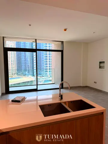 Modern 2BR Apartment | Peninsula Two | City & Pool Views