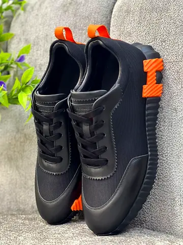 Black and orange Hermes Bouncing sneakers