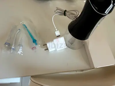 Portable Oral Water Flosser with Extra Nozzles - Lightly Used