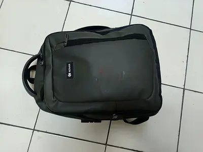 Green Waterproof Laptop Backpack - Good Condition