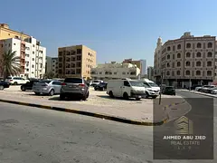 Corner Plot for Sale in Al Nakhil, Ajman, Located on Two Streets, 3,703 Sq. Ft., G+4 Permit, Prime L