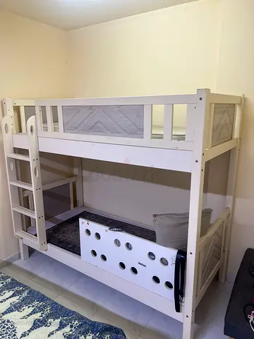 White wooden bunk bed with ladder - good condition