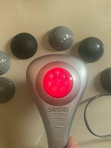 Handheld electric body massager with multiple attachments (works well)