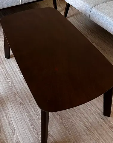 Dark wood rectangular coffee table — good used condition
