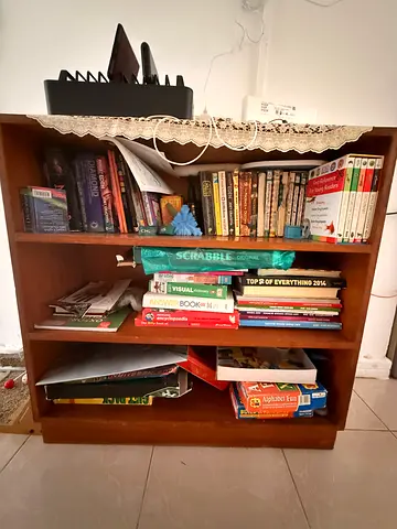 Wooden low bookcase/shelving unit - compact storage