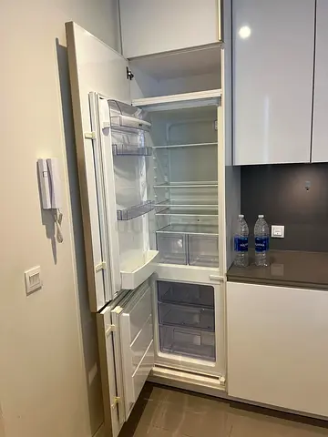 Built in fridge with bottom freezer for sale in good condition from Zanussi.  An Italian brand.