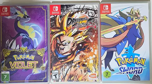 Three Nintendo Switch Game Cartridges — Pokémon Sword, Pokémon Violet, Dragon Ball FighterZ