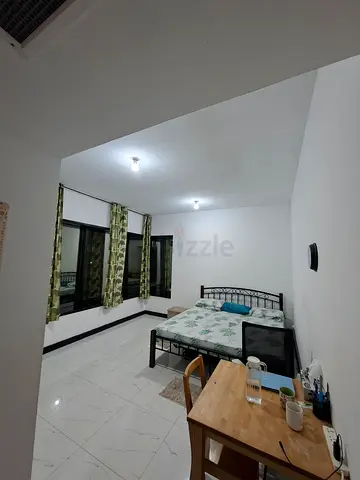 Furnished Master Bedroom with Attached Bathroom