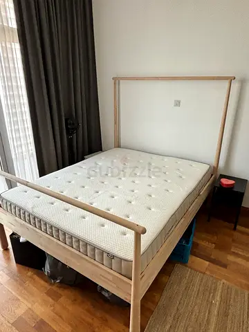 Solid IKEA wood bed frame with mattress - light oak finish. Inc. 1 year old mattress