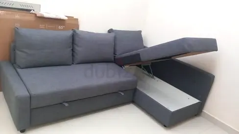 Grey L-Shaped Sofa Bed with Integrated Storage