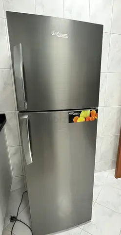 Silver top-freezer refrigerator - Good working condition