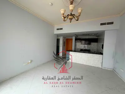 One-bedroom apartment with open view, free AC, gym and pool. Prime, lively location near all services with easy access to Dubai.