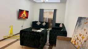 Luxury apartment, second occupancy, one bedroom and living room with a balcony and open view. Ajman,