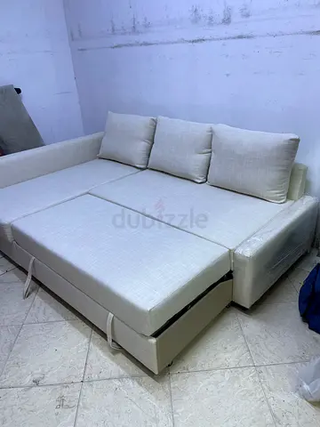 Comfortable Cream Fabric Sofa Bed with Cushions