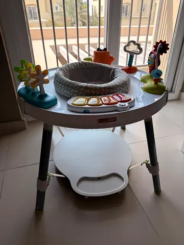 Skip hop - Baby Activity Jumper / Exersaucer with Toys - perfect condition