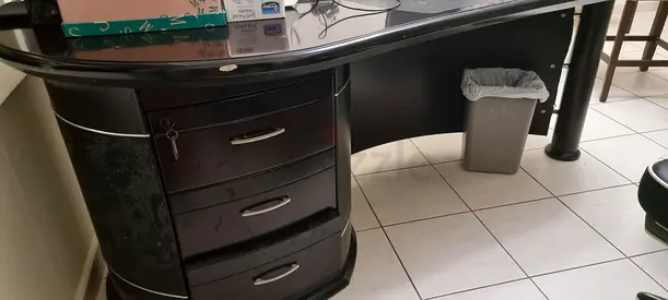Dark wood curved office desk with storage drawers - good condition