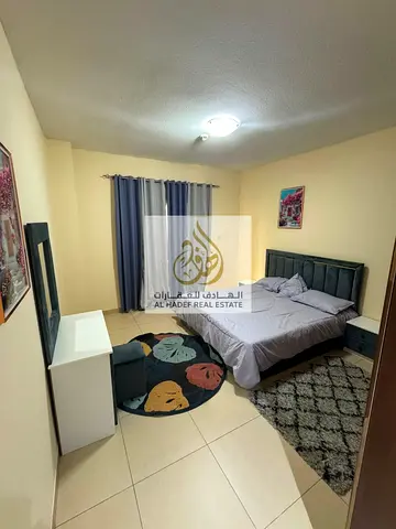 Monthly rent in Ajman, Al Jurf 2 area, Jasmine City Center Towers: One bedroom and living room, newly furnished, 2 bathrooms, balcony, parking space,