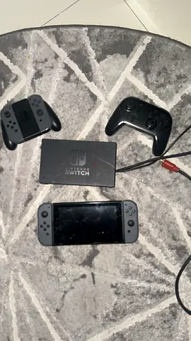 Nintendo Switch console with Joy-Con, Pro Controller and dock - used