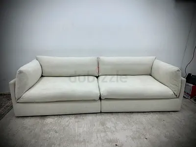 Like new condition the loom collection three seater sofa