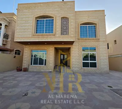 Villa for sale in Al Rawda 1, Ajman | Two floors and a roof with elevator, 5600 sq ft | 5 master bedrooms, majlis, and spacious kitchen | Includes ele
