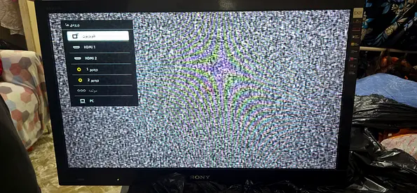 Sony 32-inch LED TV - used, powers on (no signal/static shown)
