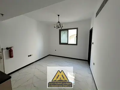 A spacious studio apartment in Al Jurf 2, near Al Aqsa School, close to all services and main roads, with easy access to Dubai and Sharjah.
