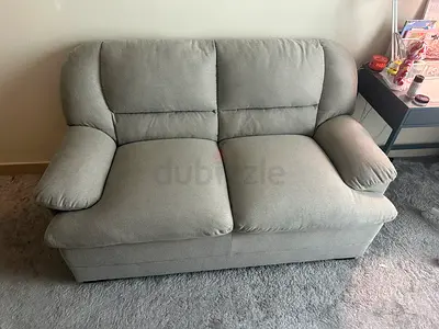 Light grey 2-seater fabric sofa — good condition