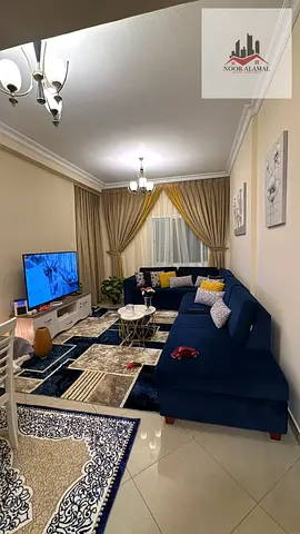 Sharjah, Al Taawun: Apartment with two bedrooms, a living room, a kitchen, two bathrooms, and a balcony.