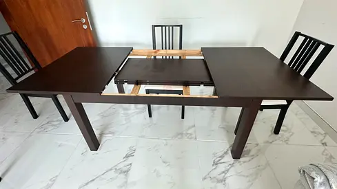 Extendable dark wood dining table (seats 6-8) - good condition