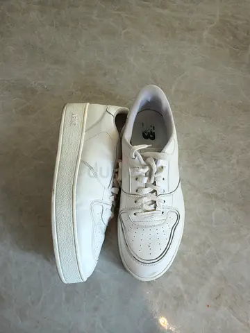 White ARNE low-top sneakers, size UK 9 — gently used
