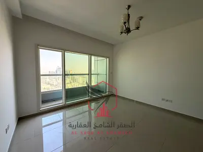اكبر غرفتين وصالة ماستر ببلكونة اطلالة مفتوحة بغرفة خدامة وباركن للايجار السنوي في أجمل ابراج الشارقة