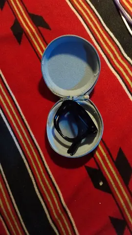 Sunglasses with hard round case - good condition