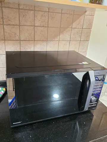 Panasonic countertop microwave - good condition, 27L (black)