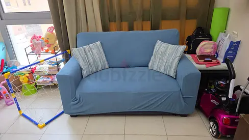 Three seater and Two-seater light blue sofa in good used condition