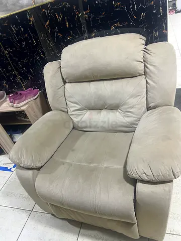 Comfortable single recliner armchair in light beige microfiber