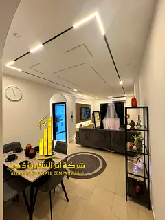 Two-bedroom apartment with a living room, newly furnished, for monthly rent in Ajman - Al Rawda 2 - 