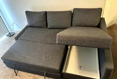 Grey L-shaped Sofa Bed with Storage — Good Condition
