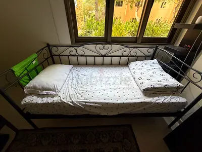 Metal daybed / single bed frame with decorative back - good condition