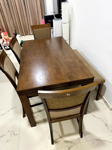 Solid Wood Dining Table with 4 Chairs and a bench - Very Good Condition. Bought from Home center
