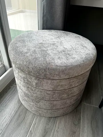 Round Grey Upholstered Ottoman with storage - Good Condition