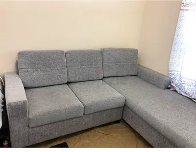 Light grey L-shaped fabric sofa - 3 seater with chaise (good condition)
