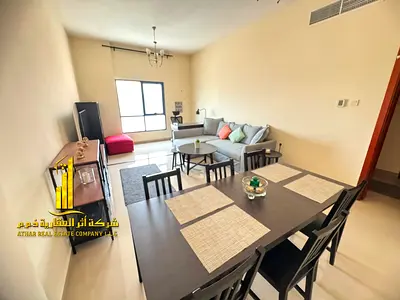 For annual rent – ​​a luxurious two-bedroom apartment with a living room and a balcony offering an open view. Ajman, Al Nuaimiya 1
