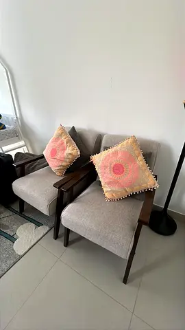 Pair of modern wooden frame accent chairs with cushions