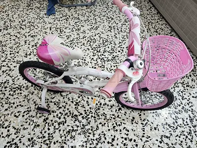 Girl's Bicycle in pink colour with front basket