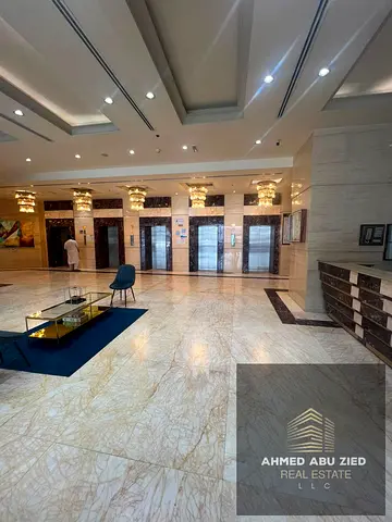 2BR Hall | Conquer Tower Ajman | Master Bedroom | Spacious Layout | Built‑in Wardrobes | Balcony with Full Open View | 2 Bathrooms | Free Parking