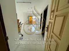 Two bedrooms and a living room in Al Butinah, available for single occupancy, with a balcony and no 