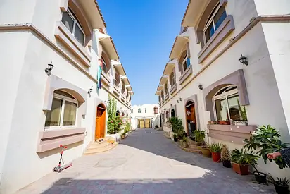 Spacious 3-bedroom villa in Sharqan, Sharjah, featuring split air conditioning, for 65,000.