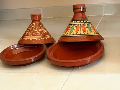 Pair of traditional Moroccan tagine pots - clay cooking dishes