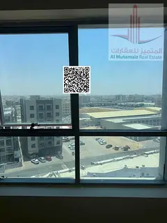 One-bedroom apartment with a living room in Garden City Towers, Al-Hamidiyah.