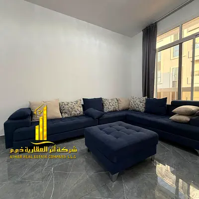 Two-bedroom apartment with a living room in Ajman - Al Rashidiya 2 - behind the Ruler's Palace - furnished with hotel-style furniture for monthly rent